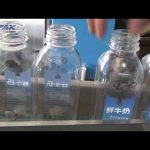 Automātiska divpusēja plastmasas kvadrātveida pudeles marķēšanas mašīna